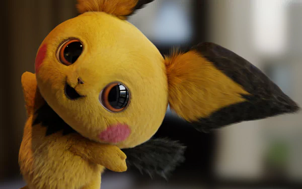 A high-definition desktop wallpaper featuring Pichu from Pokémon Detective Pikachu, showcasing its adorable expression and vibrant colors.