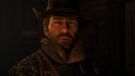 HD desktop wallpaper featuring Arthur Morgan from Red Dead Redemption 2 video game, showcasing his rugged appearance with a fur-lined coat and cowboy hat, set against a dark, atmospheric background.