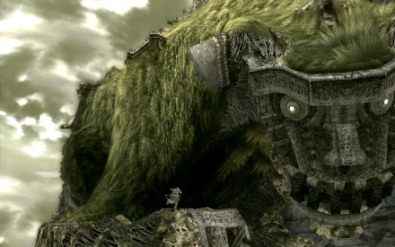 HD PC desktop wallpaper featuring a scene from the video game Shadow of the Colossus, showing a colossal moss-covered creature and a small human figure.