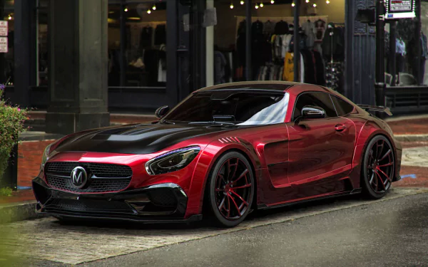 A sleek, red Mercedes-Benz AMG GT supercar parked on a city street, captured in high definition for a striking PC desktop wallpaper background.