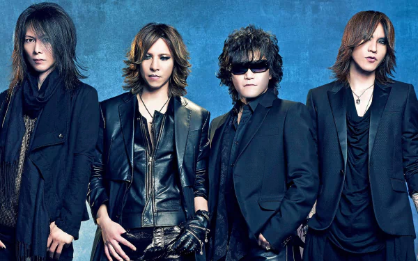 A striking HD desktop wallpaper featuring the iconic Japanese rock band X Japan, showcasing the members in stylish black outfits against a textured blue background.