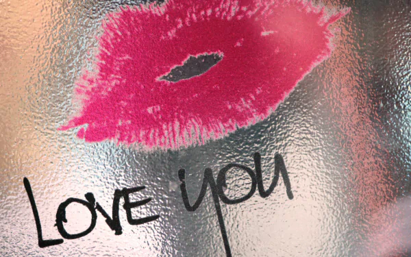 4K Ultra HD wallpaper featuring a red lipstick kiss and Love you handwritten, capturing a romantic Valentine's Day and holiday love theme.