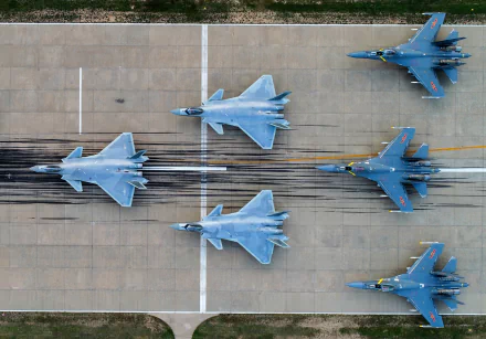 Overhead view of Shenyang J-20 and J-16 jet fighters lined up on a runway, military warplanes HD desktop wallpaper.