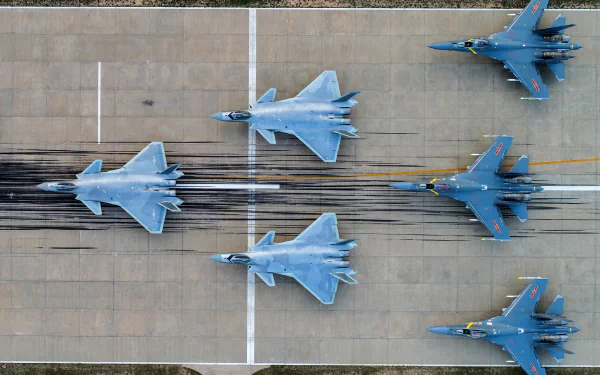 Overhead view of Shenyang J-20 and J-16 jet fighters lined up on a runway, military warplanes HD desktop wallpaper.
