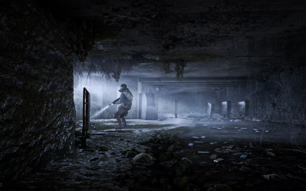 HD desktop wallpaper featuring a scene from Metro: Last Light Redux. The image depicts a lone figure exploring a dark, desolate underground environment, evoking a sense of isolation and tension.